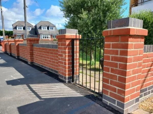 brick pillars with small metal gate