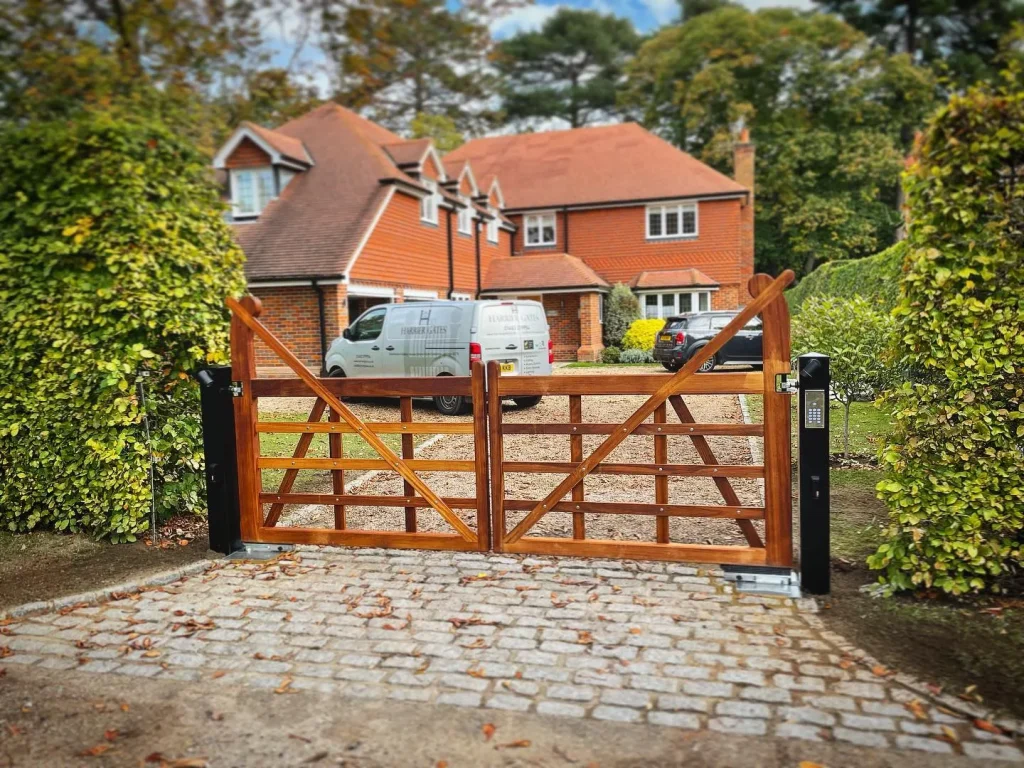 farm style wooden driveway gates with entry system