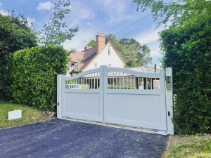 white wooden driveway gates